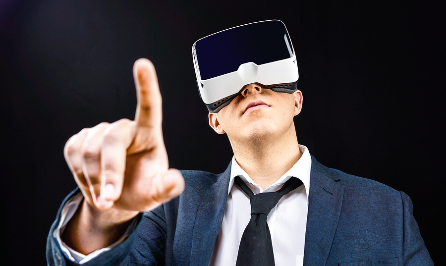 Businessman using his Virtual Reality VR glasses head mounted display
