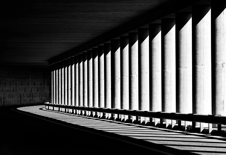 Tunnel with columns in black and white photo, abstract tunnel photo, black and white photo, architecture details close up in black and white, way, road, columns, diagonal, street photography