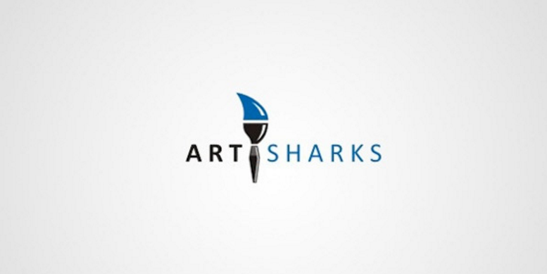 a-shark-fin-doubles-as-blue-paint-on-the-tip-of-a-paint-brush
